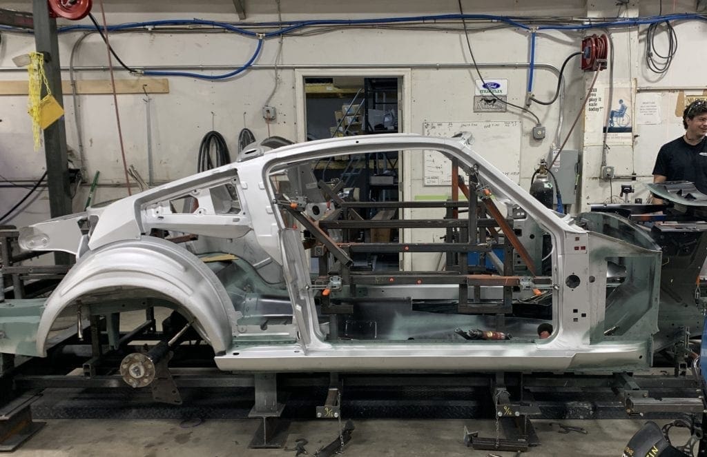 Revology Cars builds cars that combine the quality and efficiency of a major automaker with the master craftsmanship of a small one Revology Cars builds cars that combine the quality and efficiency of a major automaker with the master craftsmanship of a small one