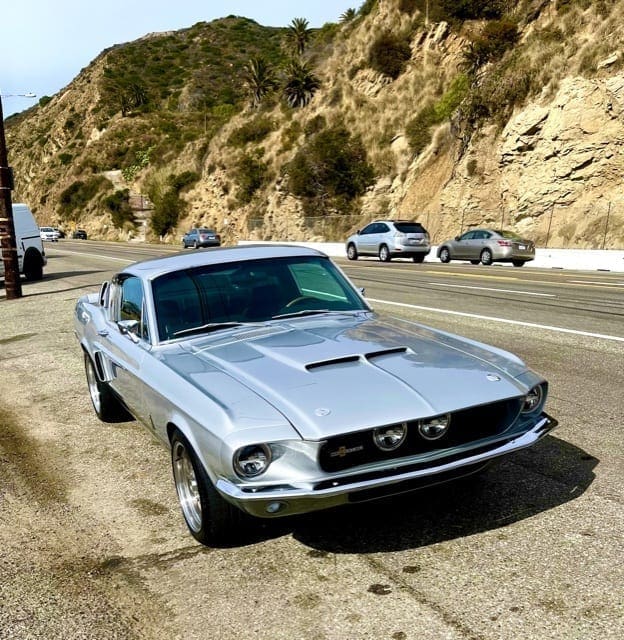 Renowned Los Angeles guitarist, Jason Sinay, celebrates his 1967 Revology Shelby GT500