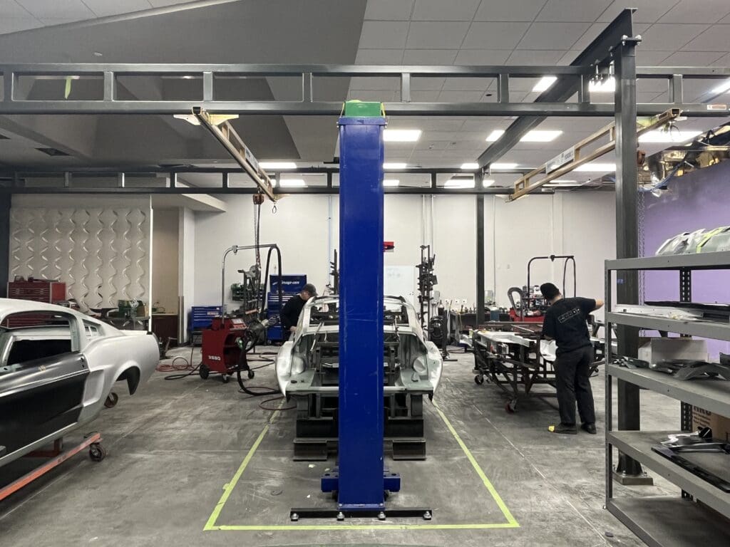 <strong>Revology customers enjoy higher quality cars as company passes 100<sup>th</sup> unibody construction milestone</strong> <strong>Revology customers enjoy higher quality cars as company passes 100<sup>th</sup> unibody construction milestone</strong>