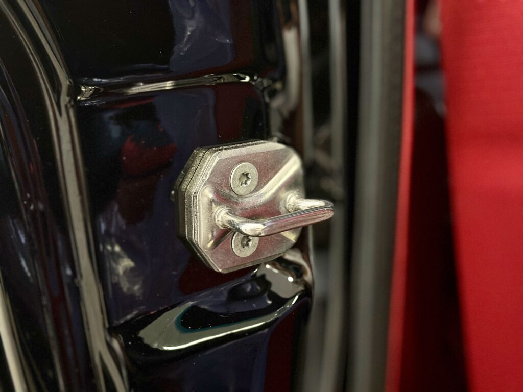 A close-up to the 1967 Mustang GT / GTA 2+2 Fastback modern door hinges.