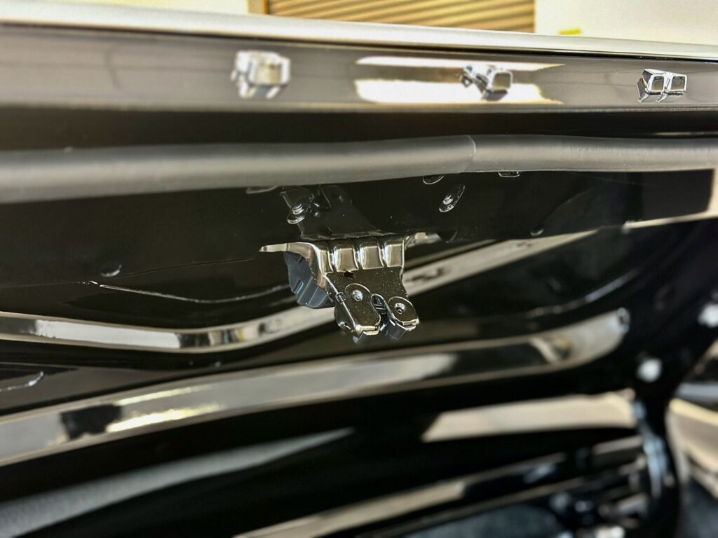 A closer look to 1967 Mustang GT / GTA 2+2 Fastback trunk deck lid latch lock.