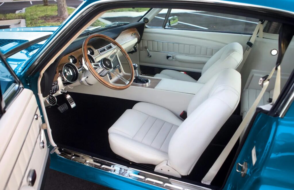 Vintage-inspired white interior of 1968 Shelby GT350.