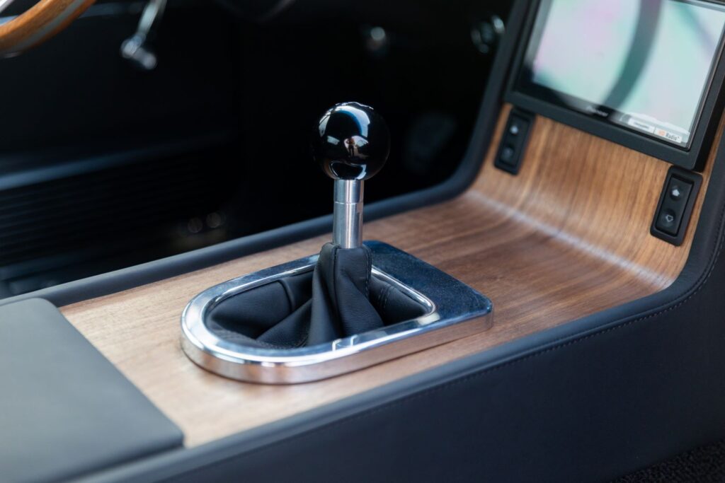 1968 Mustang GT Fastback manual gear shifter on wood trim